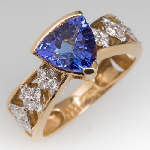Anello d'oro vintage con pietra blu e zirconi vuoti