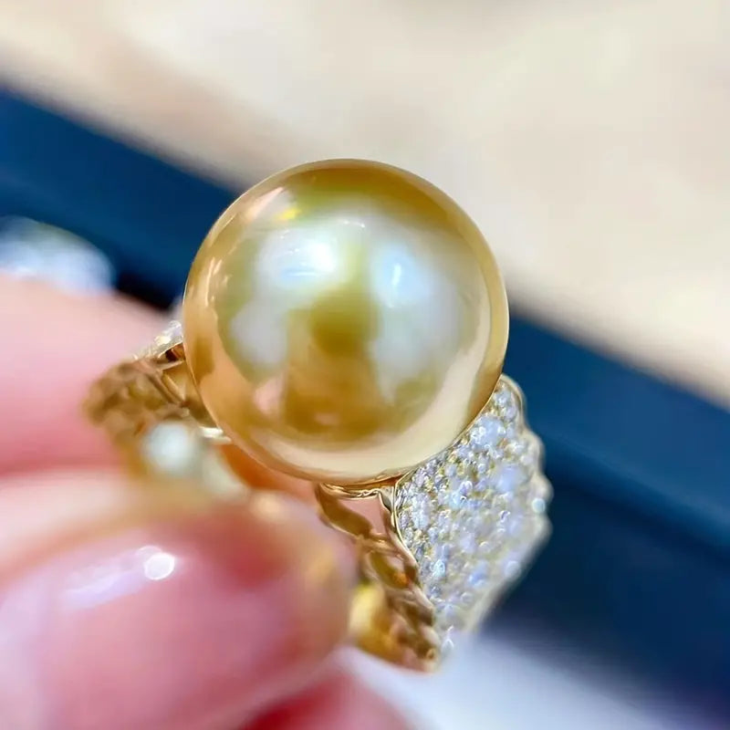 Anello luminoso con perla d'oro d'epoca