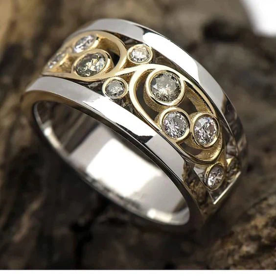 Anello vintage in oro e argento con edera zirconia