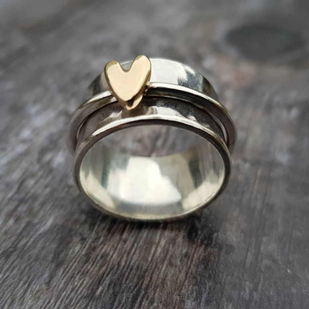 Anello d'argento con cuore d'oro vintage