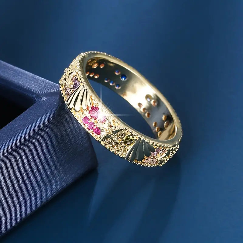 Anello Oceano in oro vintage con zirconi rossi brillanti