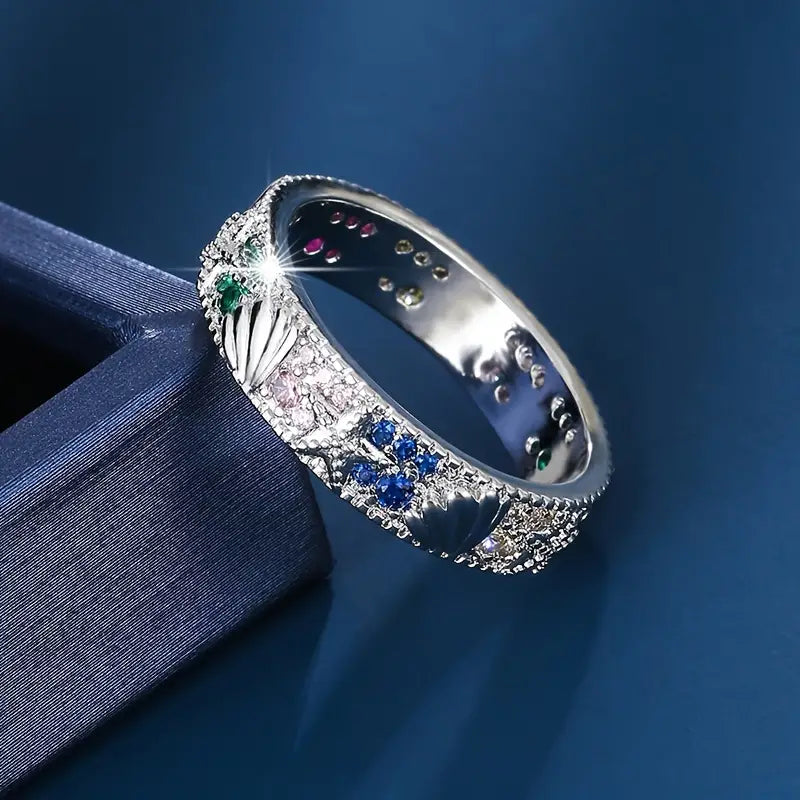 Anello d'argento vintage con zirconi blu dell'oceano