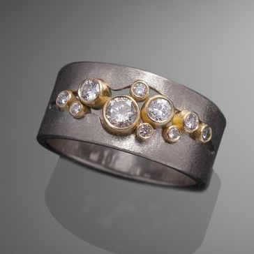 Anello vintage con intarsio di zirconi placcato argento