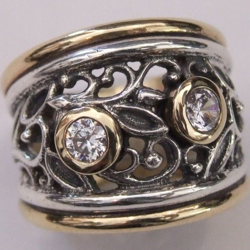 Anello vintage con zirconi cavi in argento e oro