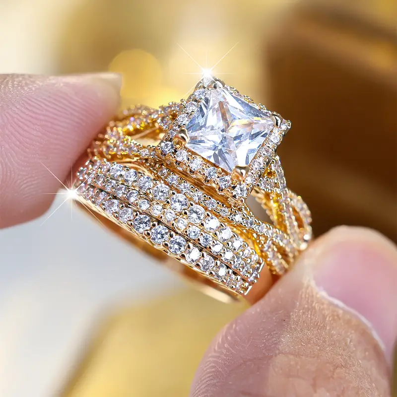 Set di anelli scintillanti in oro vintage