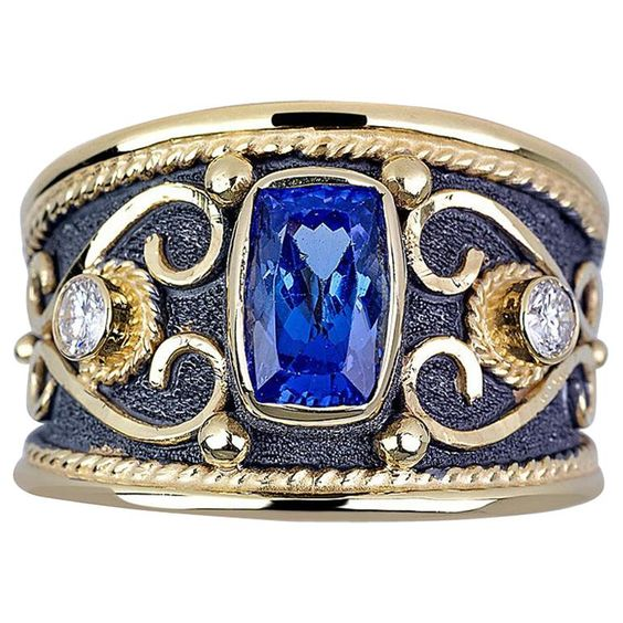 Anello d'oro con pietra blu d'epoca