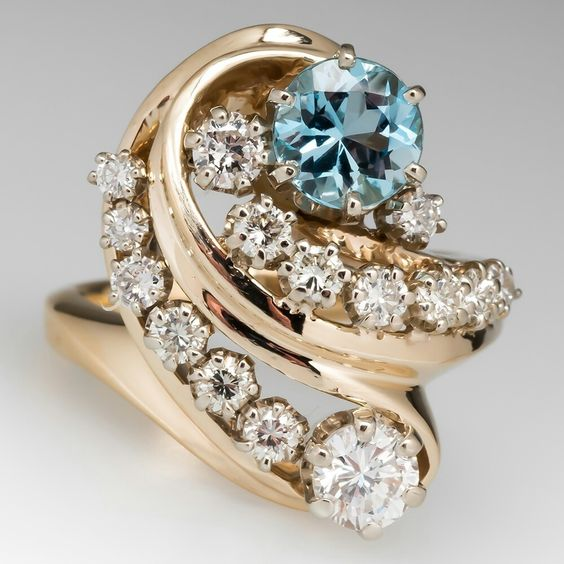 Anello vintage a spirale blu con zirconi d'oro