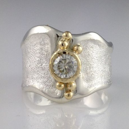 Anello vintage in argento e oro con zirconi