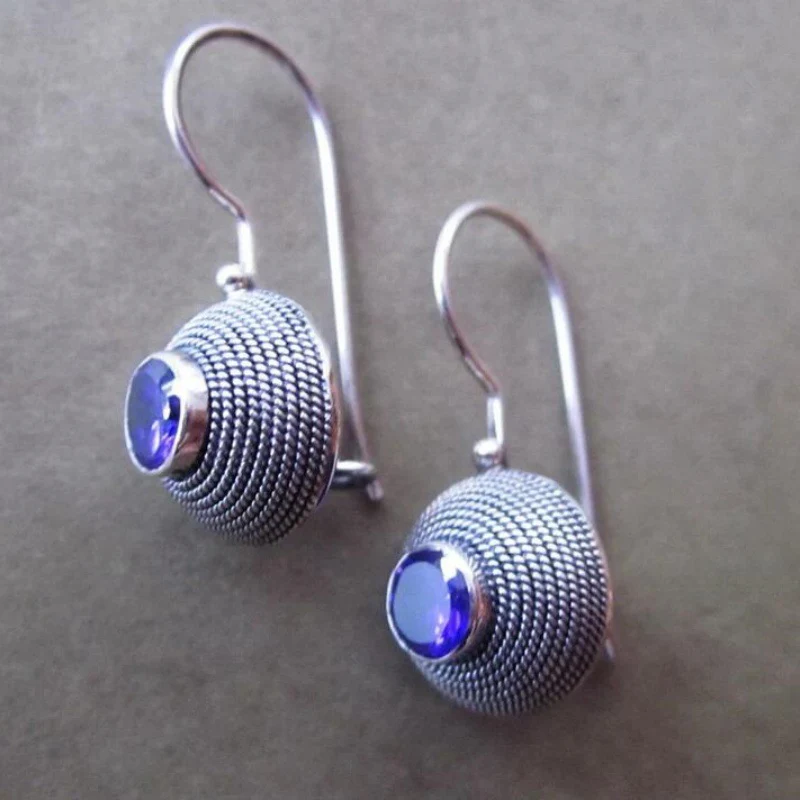 Orecchini vintage con pietre blu arrotondate