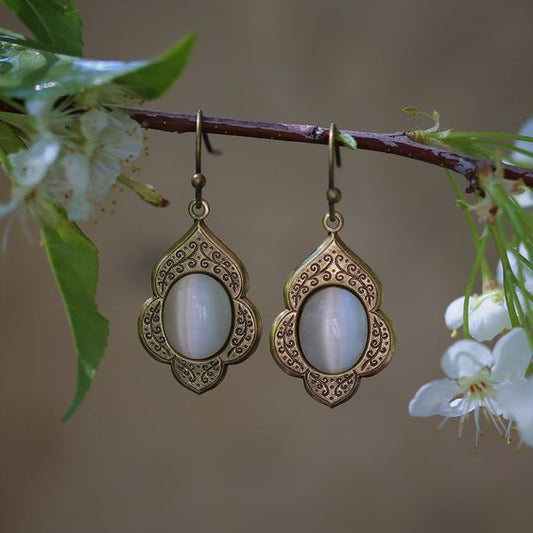 Orecchini d'oro con pietre bianche vintage