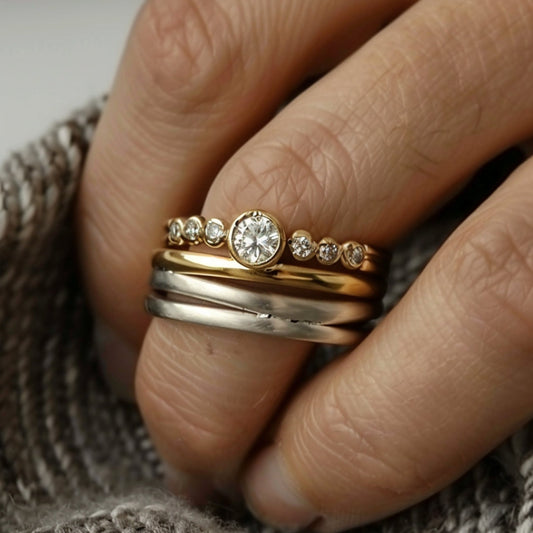 Anello a strati in argento e oro con zirconi