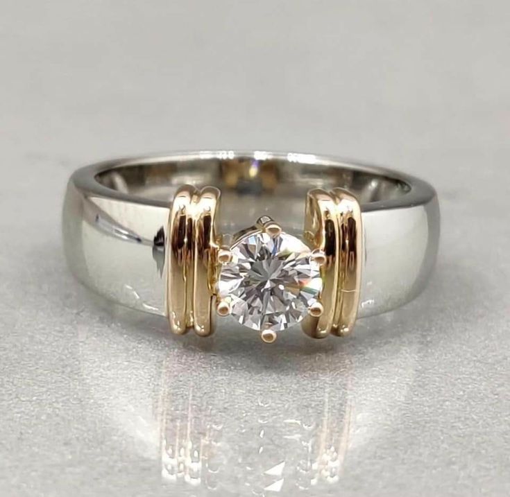 Anello vintage aperto in filo d'oro e argento
