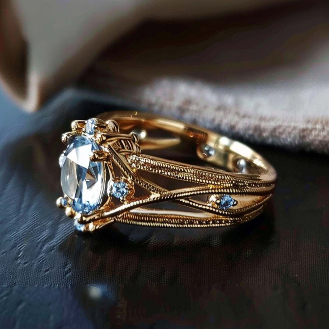 Anello in oro con intarsio di vetro blu