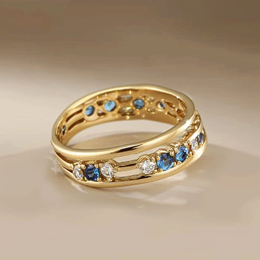 Anello in oro e zirconi blu