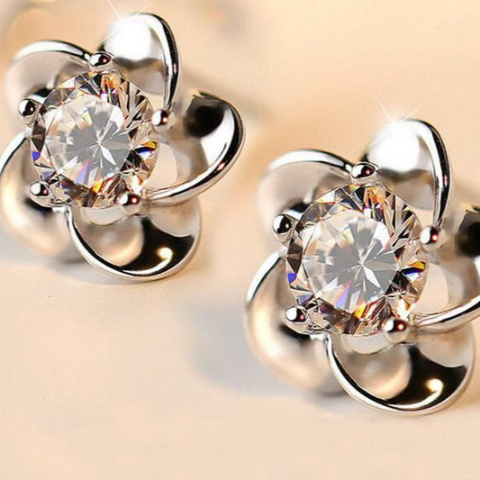 Orecchini a fiore in argento lucido vintage