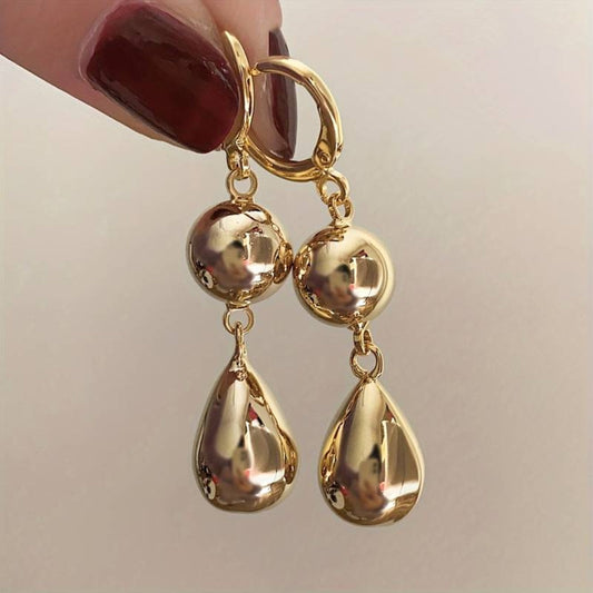 Orecchini vintage con perle d'oro pendenti