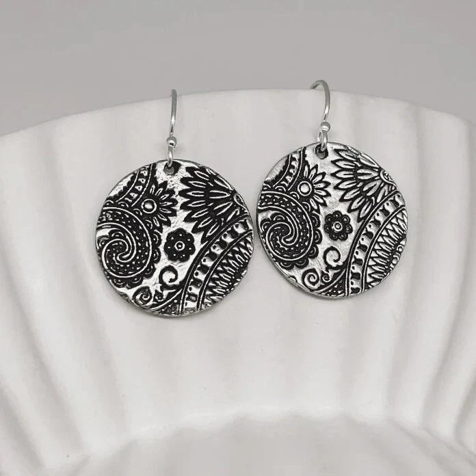 Orecchini vintage con mandala tondo argentato