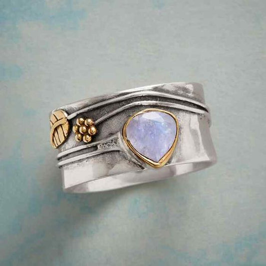 Anello vintage con pietra di luna in argento e foglie d'oro