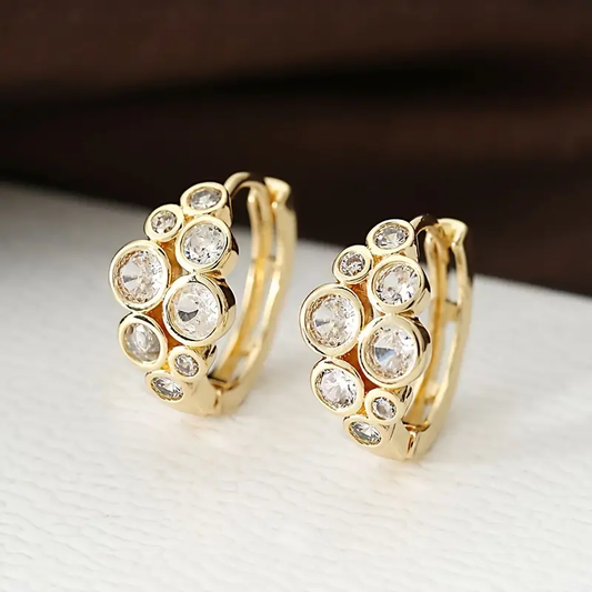 Orecchini d'oro vintage con intarsi di zirconi