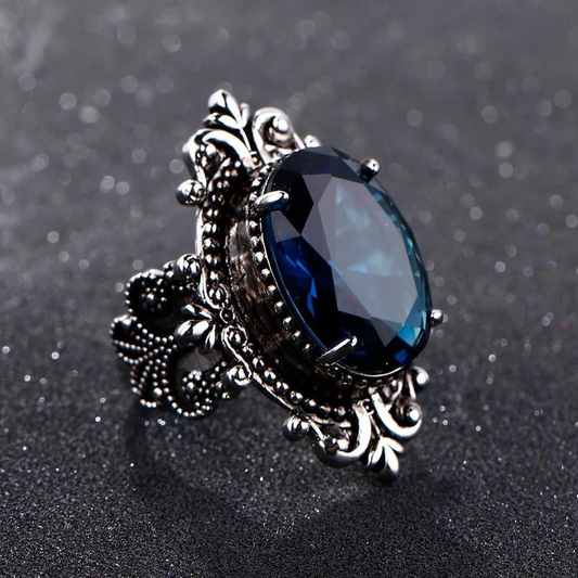 Anello vintage con pietra blu scuro