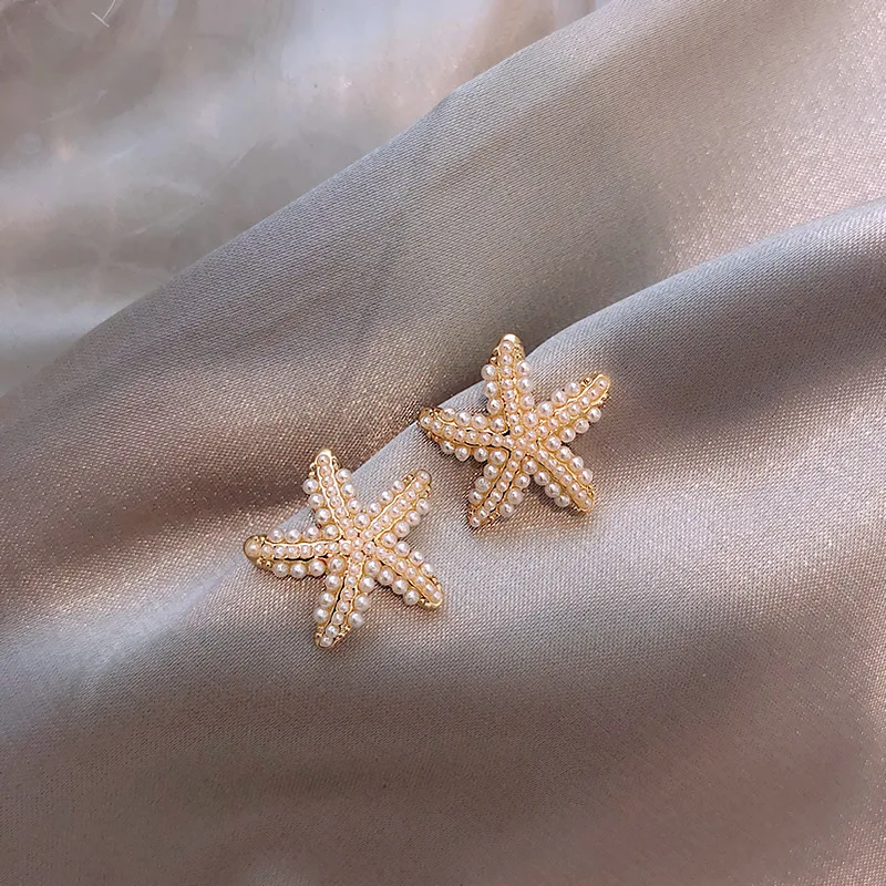 Eleganti orecchini di perle a forma di stella marina