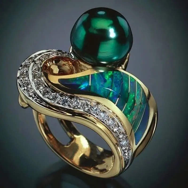 Anello vintage con perle verdi e zirconi