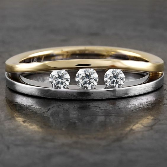 Anello vintage in oro e argento con triplo zircone