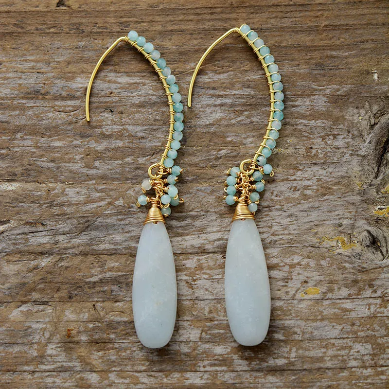 Orecchini vintage con pietre bianche pendenti
