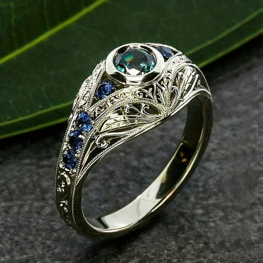 Anello luminoso d'argento blu-verde d'epoca